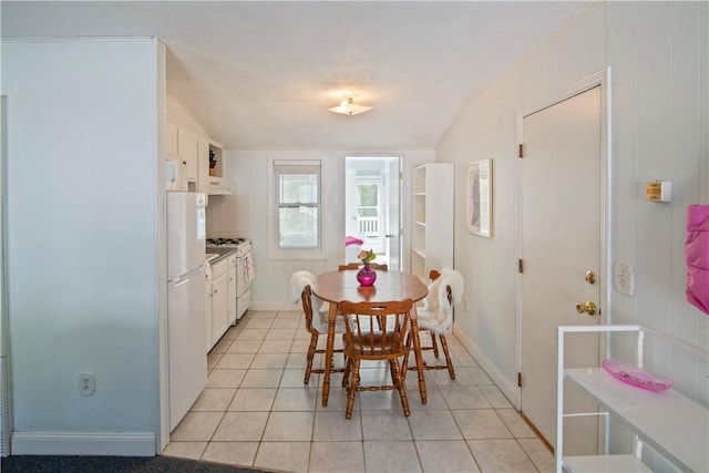 88 Old Post Rd Unit 10, Westerly, RI 02891 - dining area with light tile patterned floors and baseboards