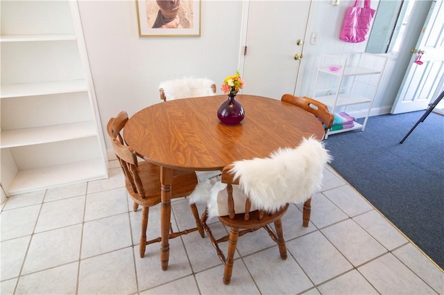 88 Old Post Rd Unit 10, Westerly, RI 02891 - dining space with light tile patterned flooring and light colored carpet