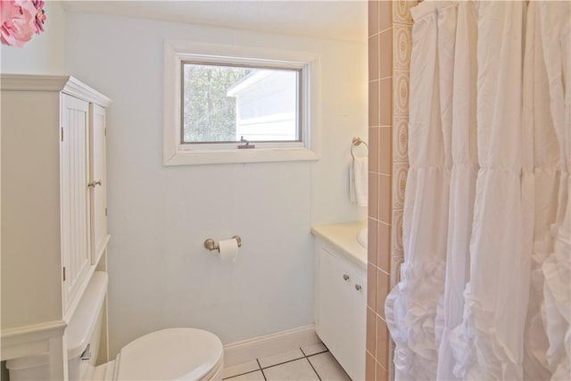 88 Old Post Rd Unit 10, Westerly, RI 02891 - bathroom with toilet, vanity, tile patterned flooring, a shower with shower curtain, and baseboards