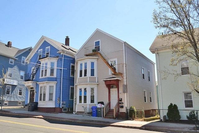 view of front of house with fence