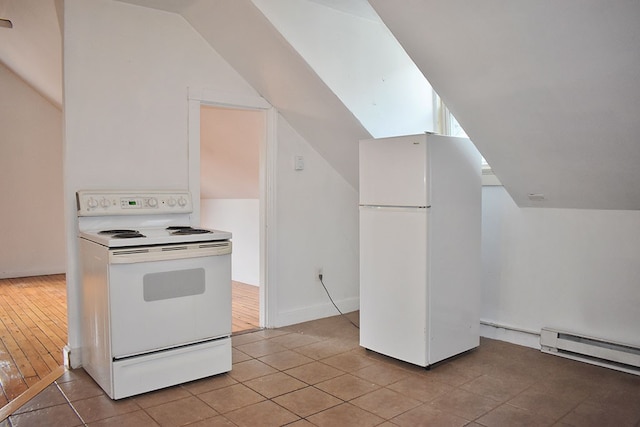 kitchen with white appliances, vaulted ceiling, light tile patterned floors, and a baseboard radiator