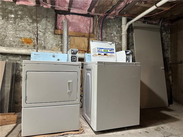 laundry room featuring washing machine and dryer