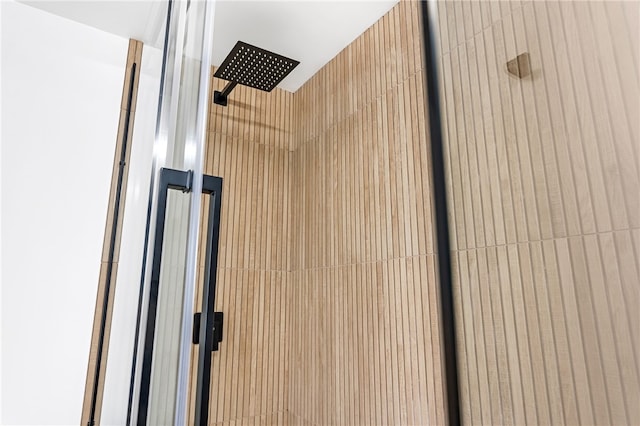 bathroom view of tiled shower