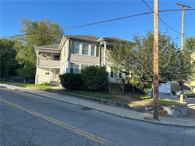 243 Transit St, Woonsocket, RI 02895 - view of front of property featuring stairway