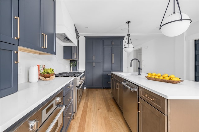 104 Second St, Newport, RI 02840 - kitchen with stainless steel dishwasher, a sink, custom range hood, light wood-style flooring, and light countertops