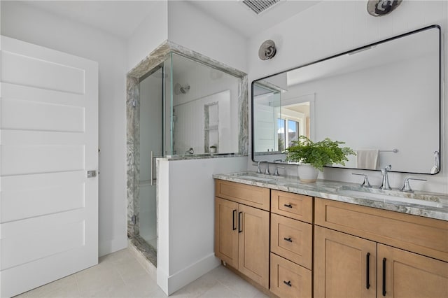 104 Second St, Newport, RI 02840 - bathroom with a shower stall, double vanity, and tile patterned floors