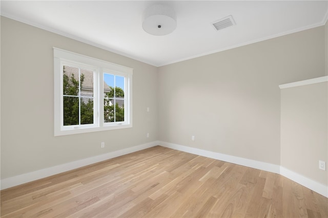 104 Second St, Newport, RI 02840 - spare room with light wood-type flooring, crown molding, and baseboards