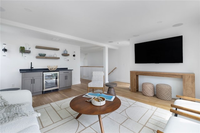 104 Second St, Newport, RI 02840 - living area with beverage cooler, wet bar, and light wood-style floors