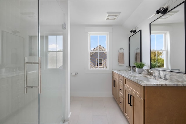 104 Second St, Newport, RI 02840 - full bath featuring double vanity, a shower stall, baseboards, and tile patterned flooring