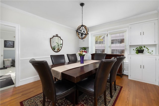 178 Gould Ave, Warwick, RI 02888 - dining room featuring a chandelier, ornamental molding, and light wood finished floors