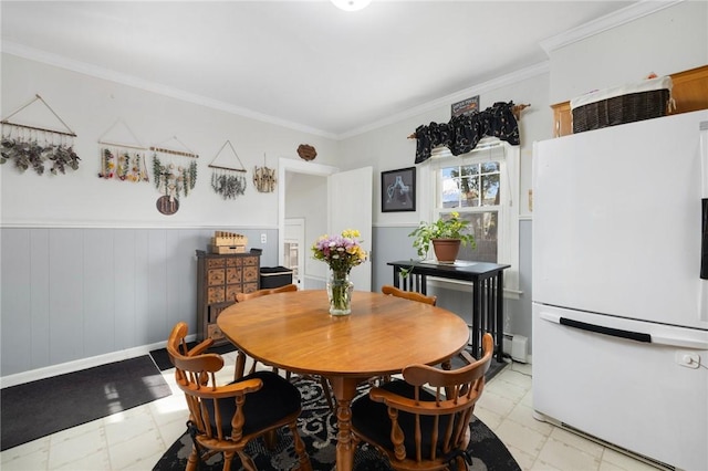 178 Gould Ave, Warwick, RI 02888 - dining area featuring ornamental molding, a wainscoted wall, and light flooring