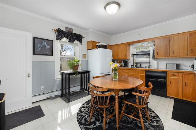 178 Gould Ave, Warwick, RI 02888 - dining area with light floors, crown molding, a wainscoted wall, and baseboard heating