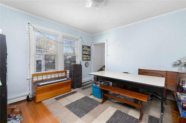 178 Gould Ave, Warwick, RI 02888 - home office with a baseboard heating unit, ornamental molding, and light wood finished floors