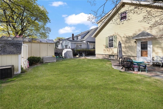 178 Gould Ave, Warwick, RI 02888 - view of yard with a shed, an outdoor structure, a patio, and a fire pit
