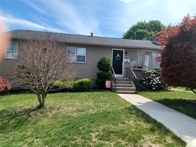 59 Columbus Ave, North Providence, RI 02911 - ranch-style house featuring a front lawn and entry steps