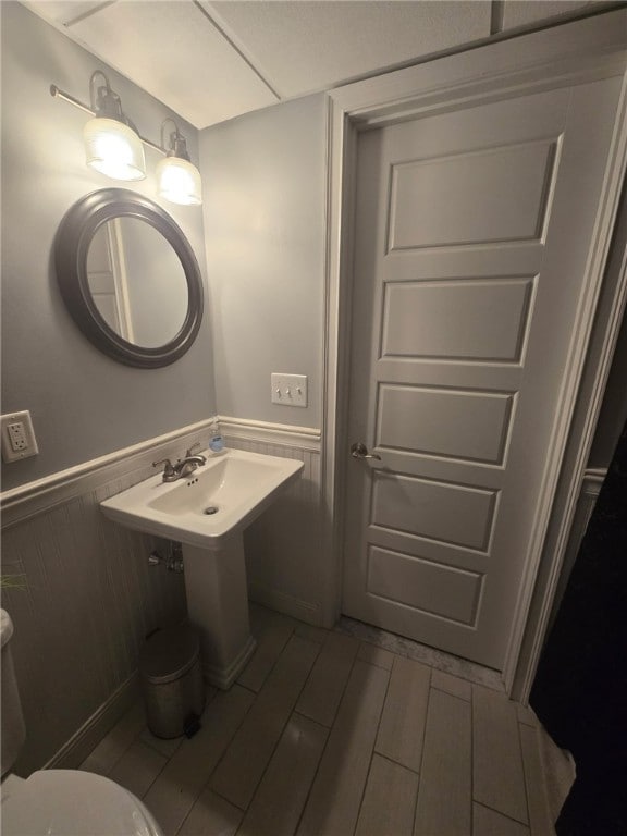 59 Columbus Ave, North Providence, RI 02911 - bathroom featuring wainscoting and toilet