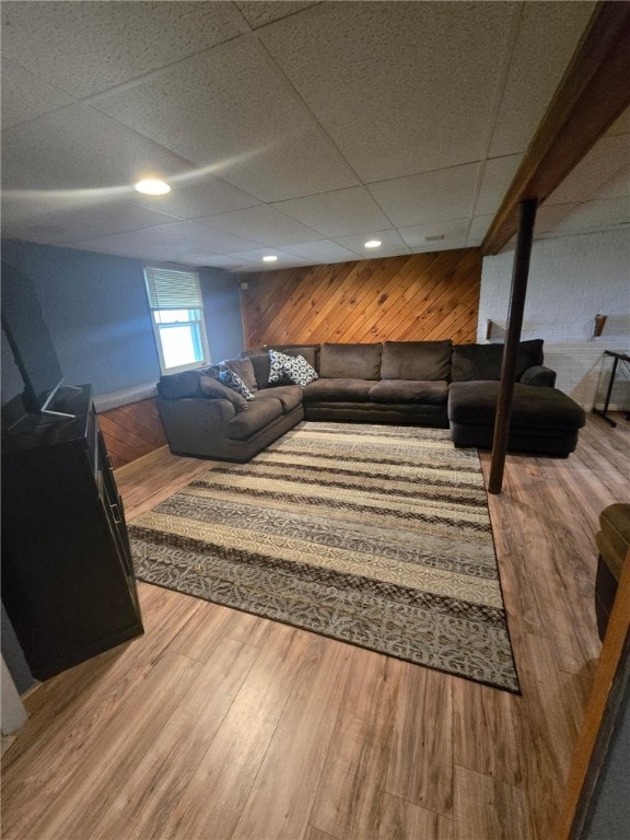 59 Columbus Ave, North Providence, RI 02911 - living area with wood walls, wood finished floors, and a paneled ceiling