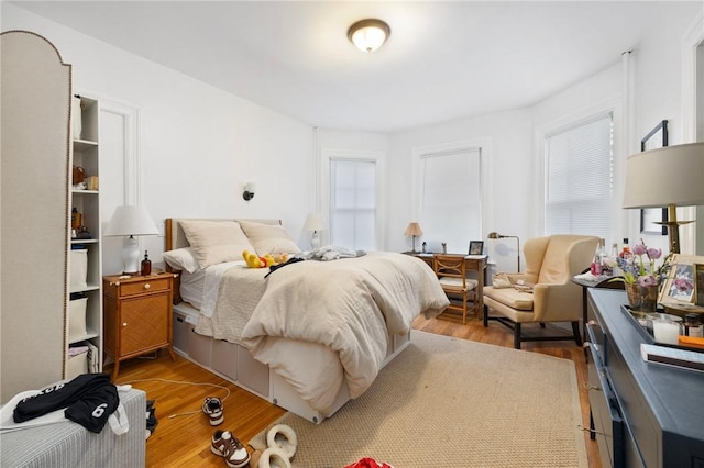 bedroom featuring light wood-style floors