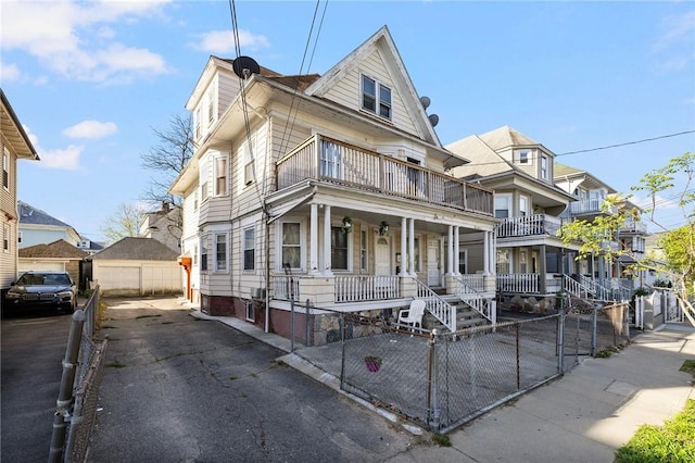 108 Lenox Ave, Providence, RI 02907 - view of front of home with a porch and a fenced front yard