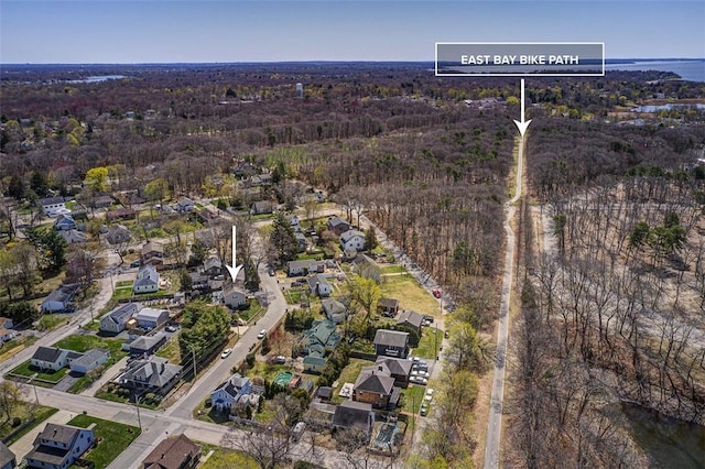 50 Harold St, East Providence, RI 02915 - aerial view of property and surrounding area featuring nearby suburban area and a heavily wooded area