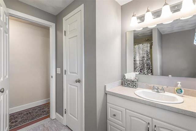 50 Harold St, East Providence, RI 02915 - bathroom with vanity and baseboards
