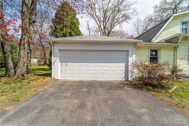 garage with driveway