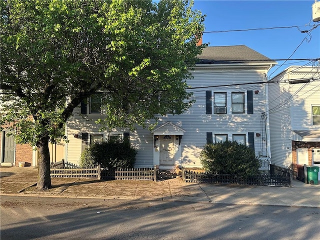372 River St, Woonsocket, RI 02895 - view of front of property with a fenced front yard