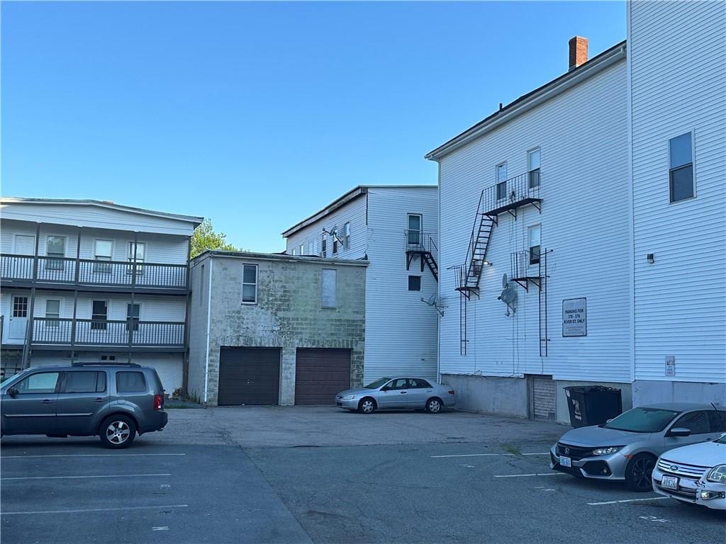 372 River St, Woonsocket, RI 02895 - view of property with uncovered parking