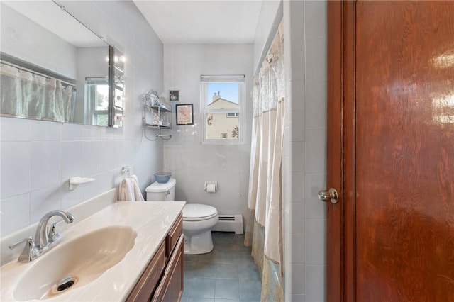 bathroom with tile walls, a baseboard heating unit, plenty of natural light, tile patterned floors, and toilet