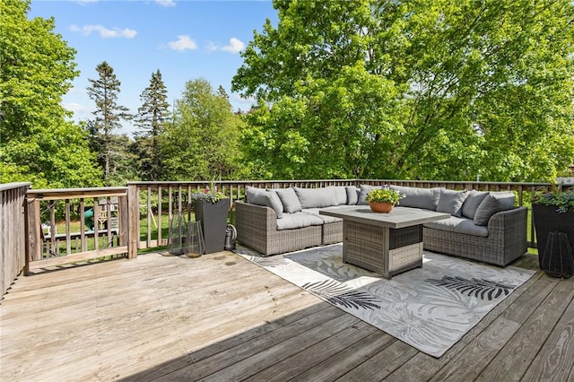 wooden deck featuring an outdoor living space