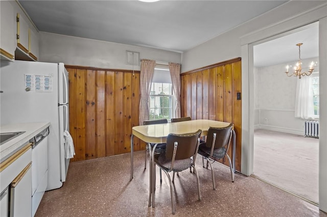 57 Sylvan Rd, East Providence, RI 02916 - dining room featuring radiator heating unit and a chandelier