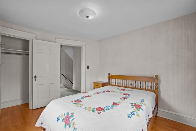 57 Sylvan Rd, East Providence, RI 02916 - bedroom with wood finished floors, baseboards, and a closet