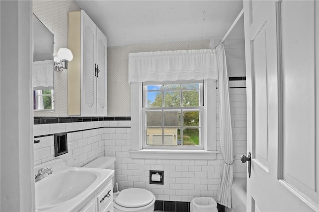 57 Sylvan Rd, East Providence, RI 02916 - bathroom featuring tile walls, toilet, healthy amount of natural light, a shower with shower curtain, and vanity