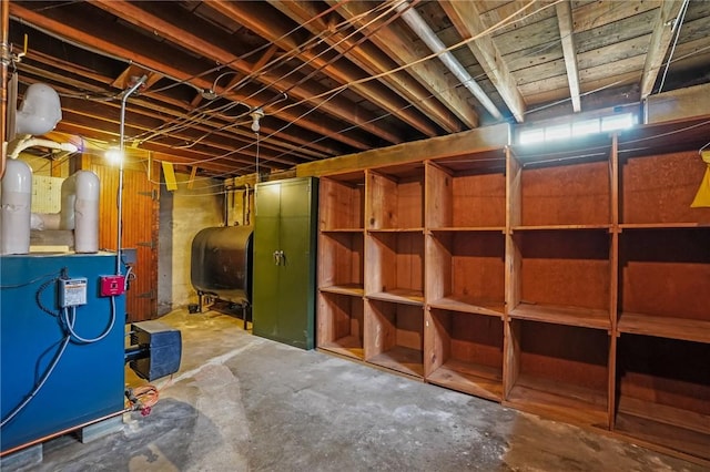 57 Sylvan Rd, East Providence, RI 02916 - unfinished below grade area featuring oil tank and a heating unit