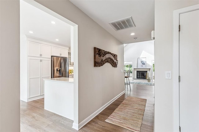 26 Bagy Wrinkle Cv, Warren, RI 02885 - corridor featuring light wood-type flooring, recessed lighting, and baseboards