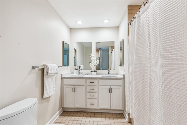 26 Bagy Wrinkle Cv, Warren, RI 02885 - bathroom featuring baseboards, toilet, tile patterned floors, and double vanity