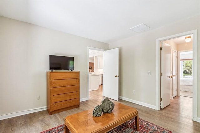 26 Bagy Wrinkle Cv, Warren, RI 02885 - living area featuring light wood finished floors and baseboards