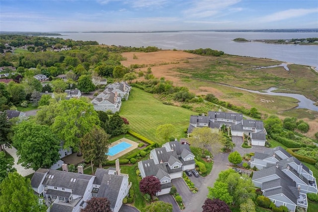 26 Bagy Wrinkle Cv, Warren, RI 02885 - aerial view of property and surrounding area featuring a large body of water and nearby suburban area