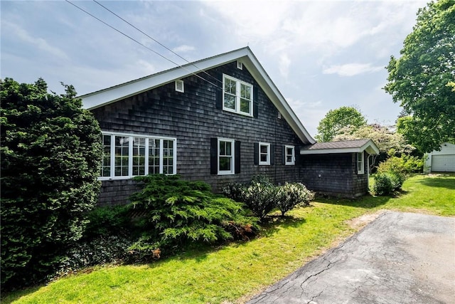 43 Standish Rd, Jamestown, RI 02835 - view of home's exterior with a yard