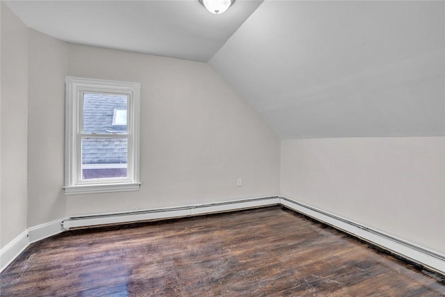 bonus room with vaulted ceiling, a baseboard heating unit, wood finished floors, baseboard heating, and baseboards