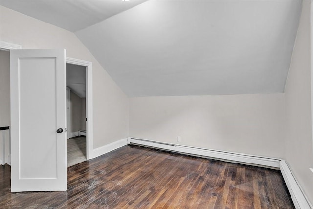 bonus room with lofted ceiling, wood finished floors, a baseboard heating unit, baseboards, and a baseboard radiator