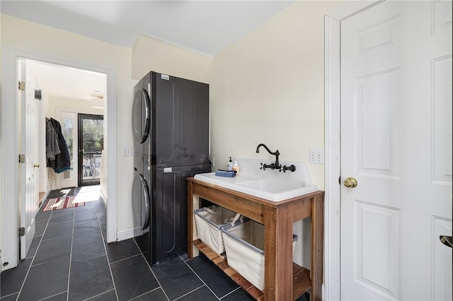 40 Charlotte Ave, North Kingstown, RI 02874 - bathroom featuring estacked washer and dryer and tile patterned floors