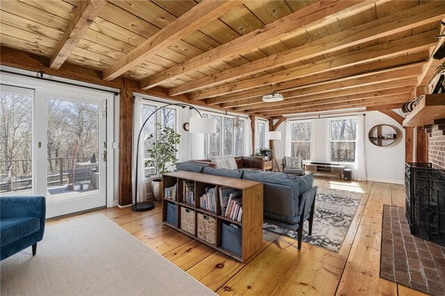 40 Charlotte Ave, North Kingstown, RI 02874 - living room featuring light wood-style flooring, beamed ceiling, and wood ceiling