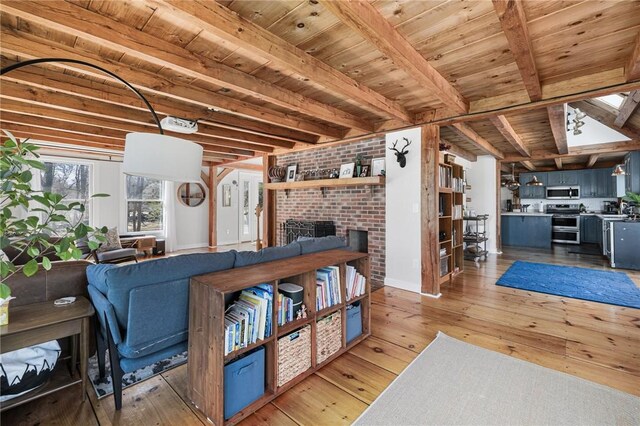 40 Charlotte Ave, North Kingstown, RI 02874 - living room with light wood-type flooring, a fireplace, beam ceiling, wood ceiling, and baseboards