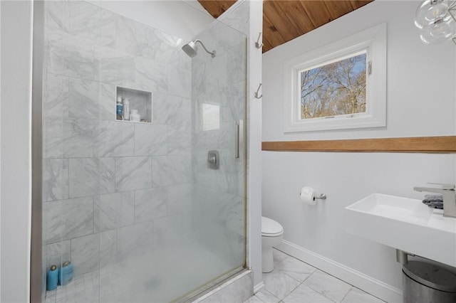 40 Charlotte Ave, North Kingstown, RI 02874 - bathroom with a shower stall, marble look tile flooring, toilet, wooden ceiling, and baseboards