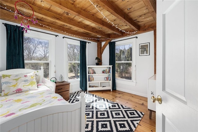 40 Charlotte Ave, North Kingstown, RI 02874 - bedroom featuring wooden ceiling, beam ceiling, multiple windows, light wood-style floors, and baseboards