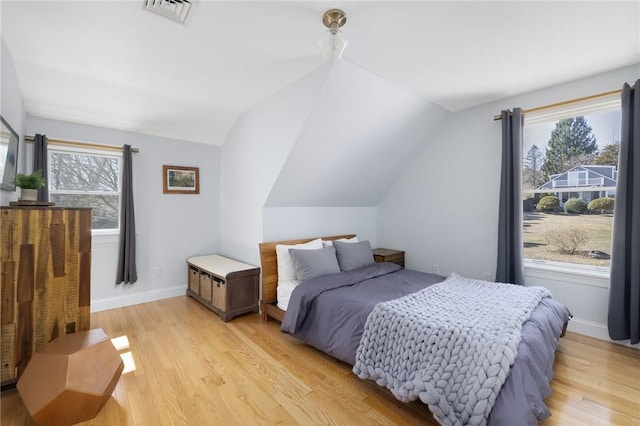 40 Charlotte Ave, North Kingstown, RI 02874 - bedroom featuring vaulted ceiling, light wood-type flooring, and baseboards