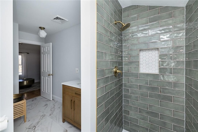 40 Charlotte Ave, North Kingstown, RI 02874 - full bathroom featuring tiled shower, marble finish floors, and vanity