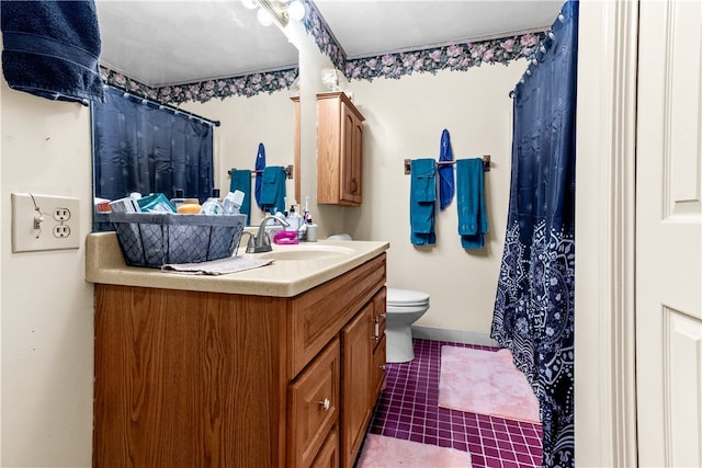 bathroom featuring vanity, toilet, baseboards, a shower with curtain, and tile patterned flooring