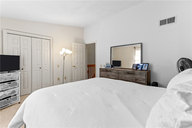bedroom featuring carpet floors and a closet